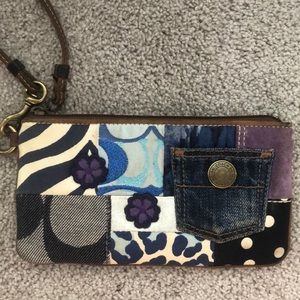 Blue colored Coach wristlet.